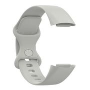 beige silicone fitbit charge 6 strap detail
