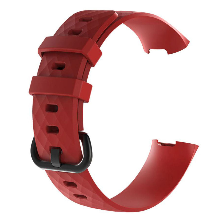 red fitbit charge 4 strap close up texture
