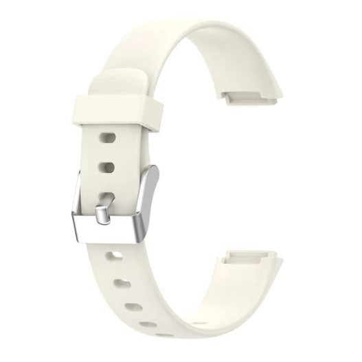 apricot fitbit luxe band with buckle fastening
